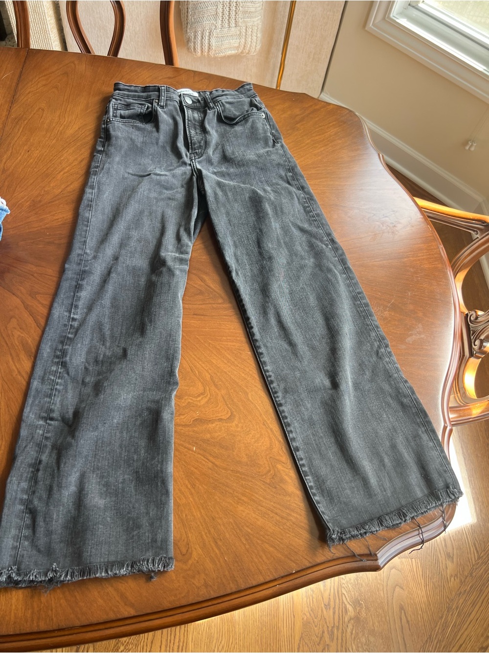 Reformation Black Washed Wide-Leg Jeans with Raw Hem